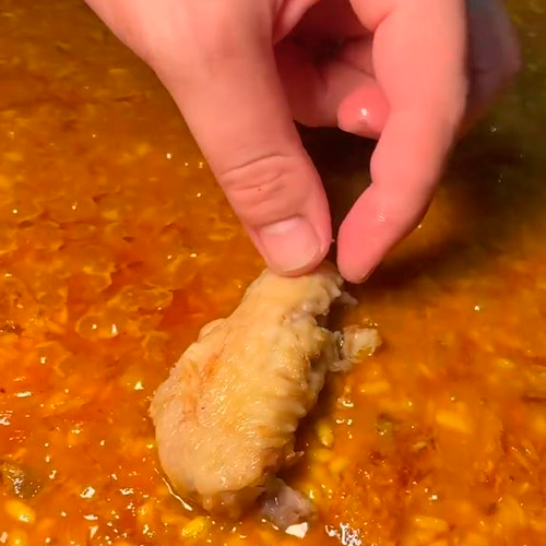  5.- Añadir costillas y alcachofas