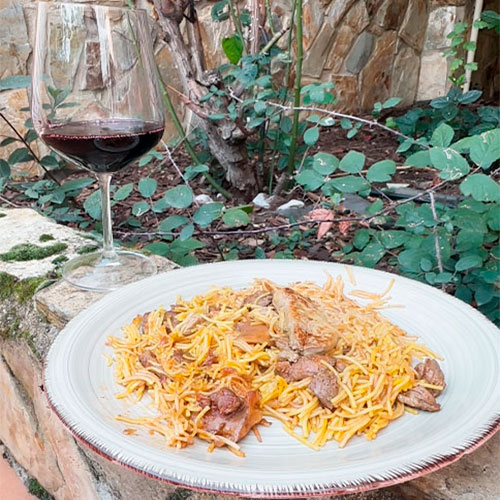 Fideuá de secreto ibérico, niscalos y foie